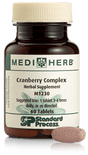 A bottle of Cranberry Complex next to a tablet.